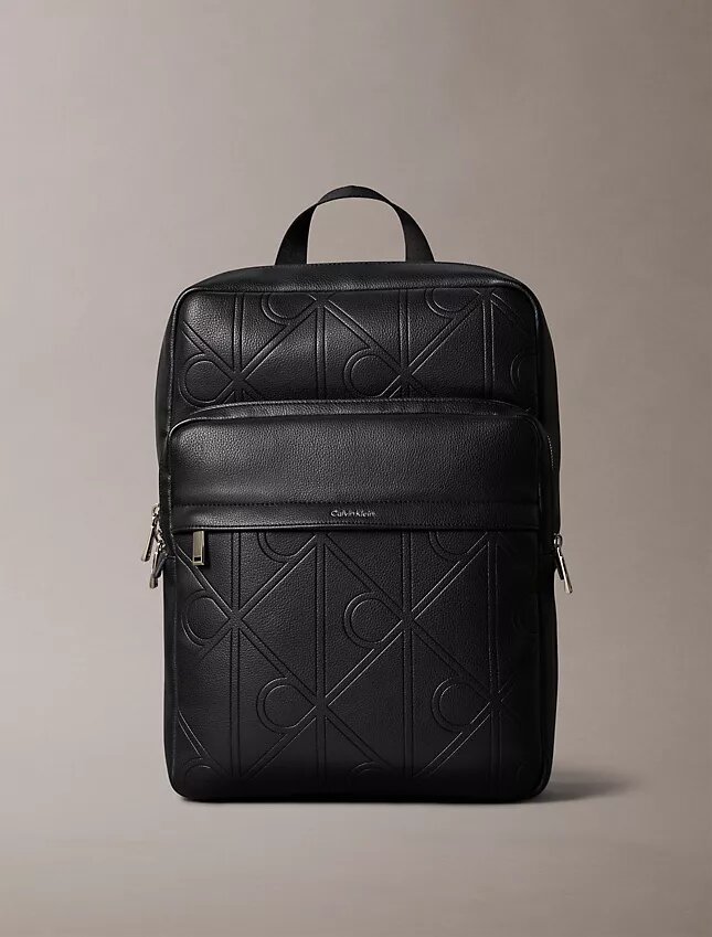 Allover Embossed Emblem Logo Round Backpack Allover Embossed Emblem Logo Round Backpack