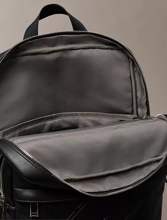 Allover Embossed Emblem Logo Round Backpack Allover Embossed Emblem Logo Round Backpack
