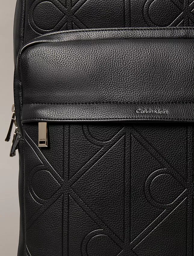 Allover Embossed Emblem Logo Round Backpack Allover Embossed Emblem Logo Round Backpack