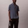 Allover Embossed Emblem Logo Slim Reporter Bag