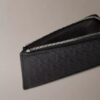 Embossed Allover Monogram Zip Wallet Embossed Allover Monogram Zip Wallet