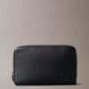 Embossed Monogram Pouch Embossed Monogram Pouch