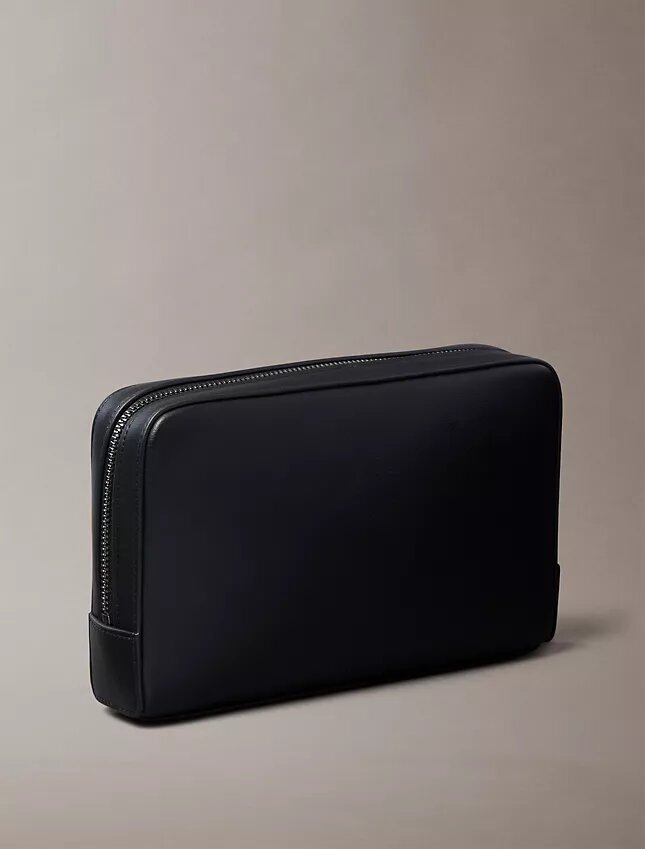 Embossed Monogram Pouch Embossed Monogram Pouch