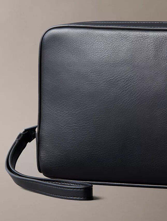 Embossed Monogram Pouch Embossed Monogram Pouch