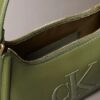 Embossed Monogram Shoulder Bag