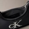 Embossed Monogram Shoulder Bag