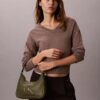 Embossed Monogram Shoulder Bag