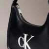 Embossed Monogram Shoulder Bag