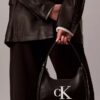 Embossed Monogram Shoulder Bag