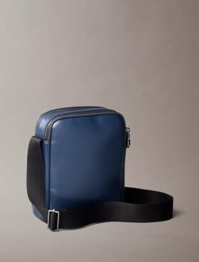 Embossed Monogram Zip Pocket Reporter Bag