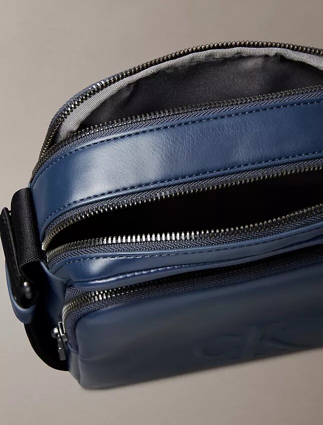 Embossed Monogram Zip Pocket Reporter Bag Embossed Monogram Zip Pocket Reporter Bag