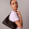 Perforated Emblem Logo Shoulder Bag Perforated Emblem Logo Shoulder Bag